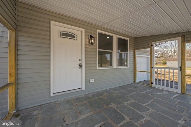 entrance to property with a porch