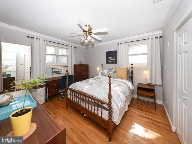 bedroom featuring light wood-type flooring, baseboards, ornamental molding, and ceiling fan