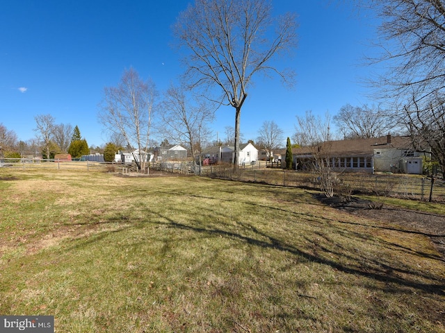 view of yard with fence