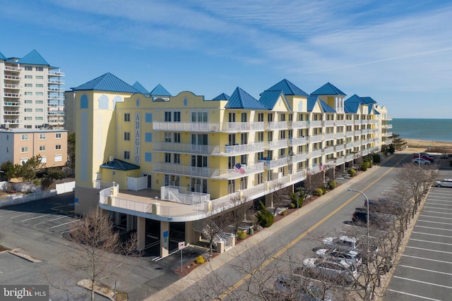 view of building exterior with a water view