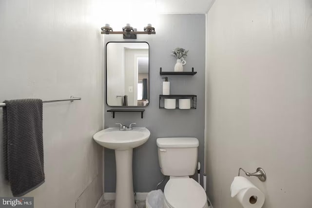 bathroom featuring toilet