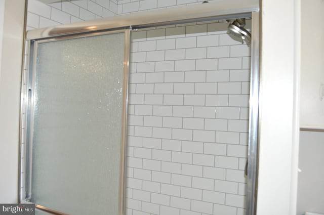 full bath featuring a stall shower