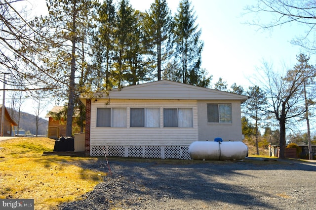 exterior space featuring brick siding