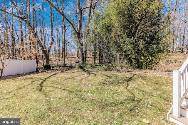 view of yard with fence