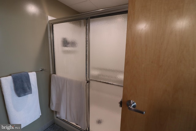 full bathroom featuring a stall shower