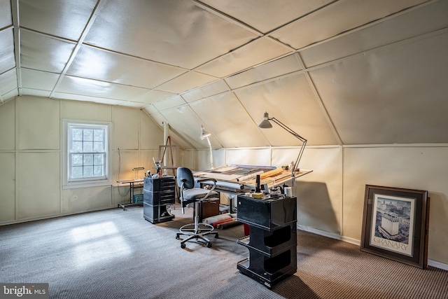 office with vaulted ceiling and carpet