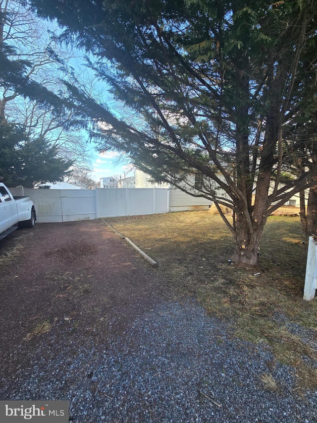 view of yard with fence