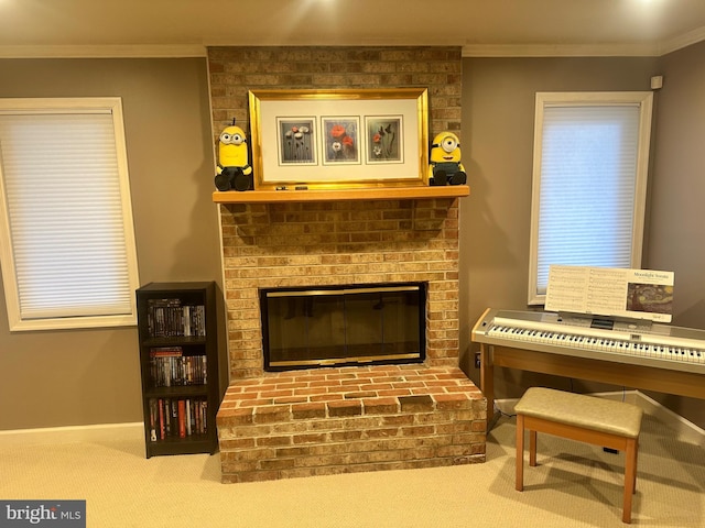 room details featuring baseboards, carpet, ornamental molding, and a fireplace