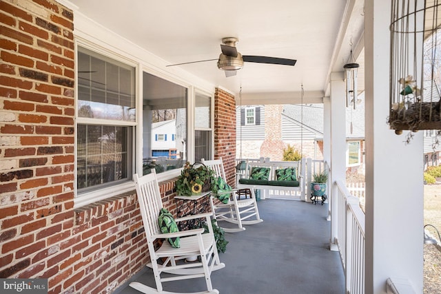 exterior space featuring covered porch and ceiling fan