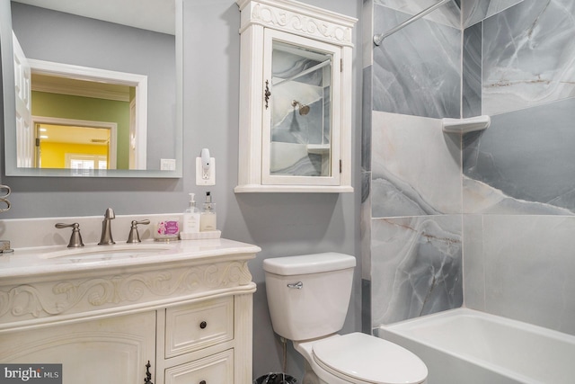 bathroom featuring shower / bath combination, toilet, and vanity