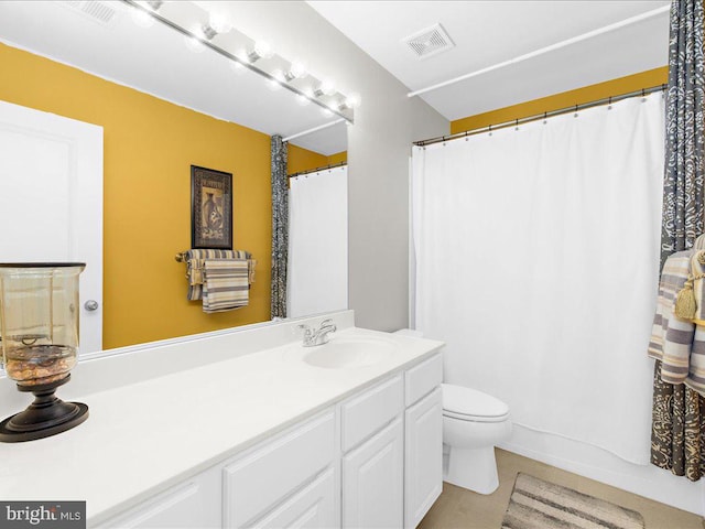 full bathroom with tile patterned floors, visible vents, toilet, curtained shower, and vanity