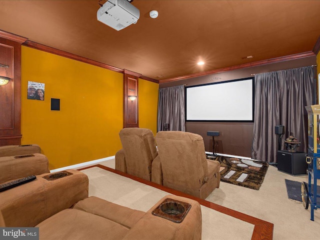 cinema room featuring crown molding, recessed lighting, baseboards, and carpet floors