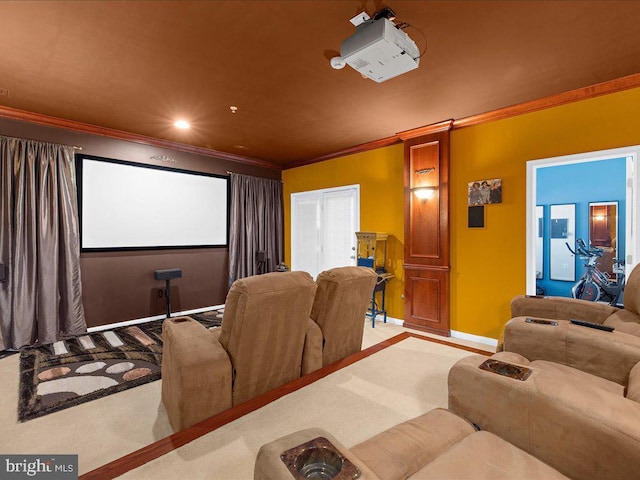 carpeted home theater featuring recessed lighting, baseboards, and ornamental molding