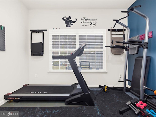 exercise area with baseboards