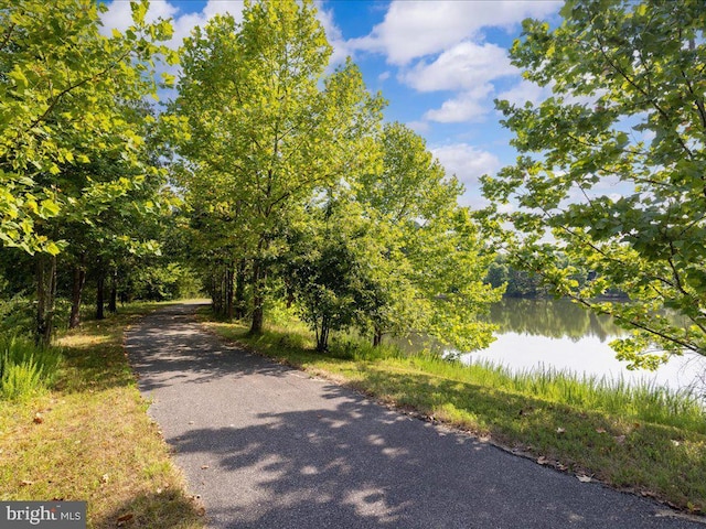 view of road featuring a water view