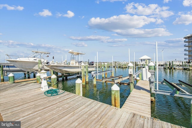 dock area featuring a water view and boat lift