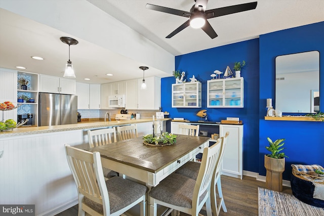 dining room featuring recessed lighting, dark wood-style floors, baseboards, and ceiling fan