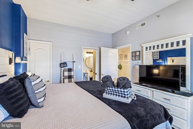 bedroom featuring visible vents and ensuite bathroom