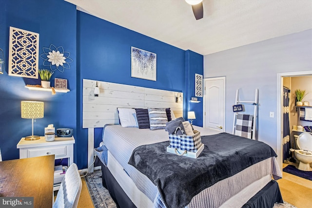 carpeted bedroom with ceiling fan