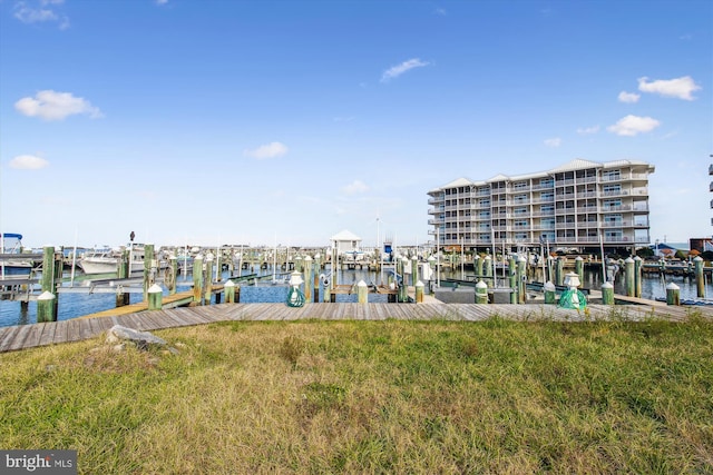 view of dock featuring a water view and boat lift