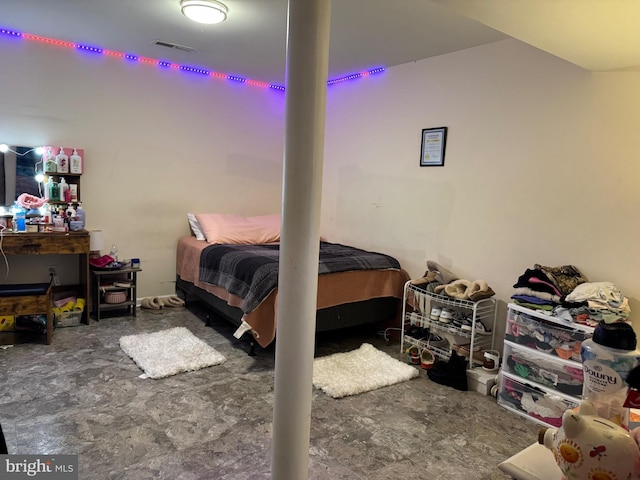 bedroom featuring visible vents