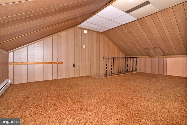 bonus room with lofted ceiling, carpet, and wood walls