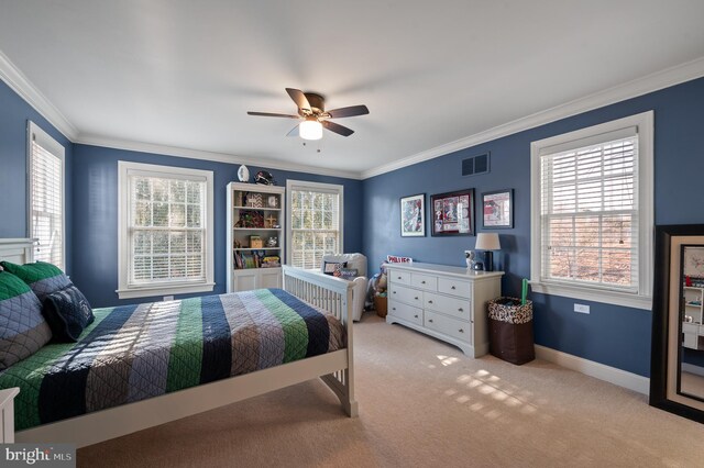 bedroom featuring multiple windows, visible vents, and ornamental molding