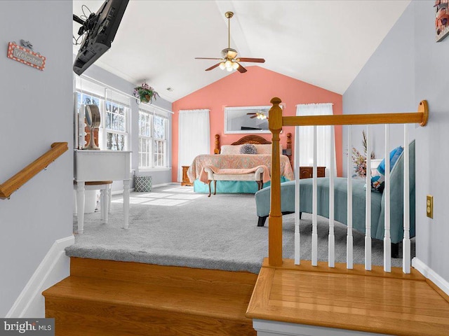 bedroom featuring vaulted ceiling, carpet flooring, baseboards, and ceiling fan