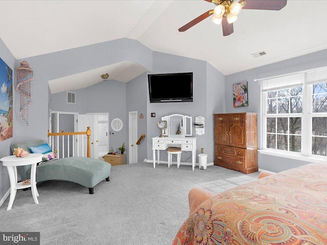 bedroom featuring visible vents, ceiling fan, lofted ceiling, and carpet floors