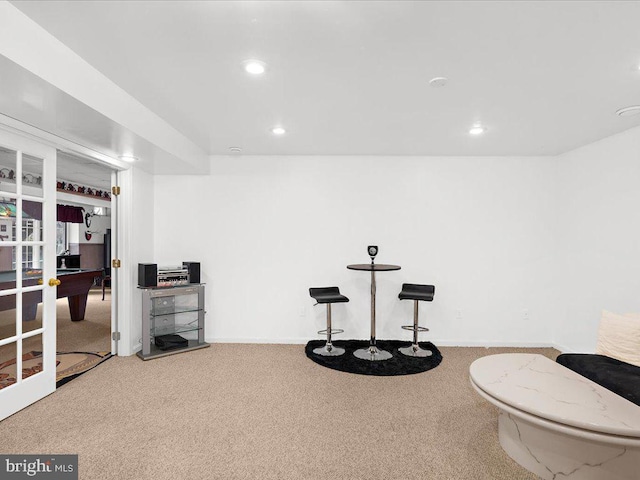 interior space with recessed lighting, carpet, baseboards, and french doors