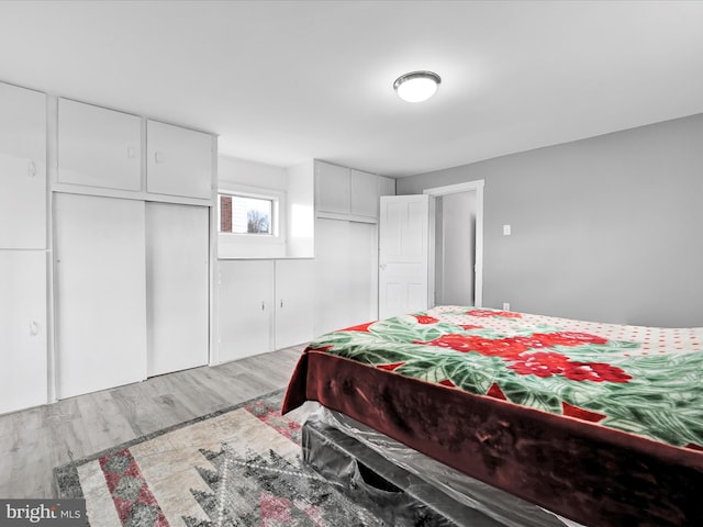 bedroom featuring light wood-type flooring