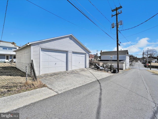 detached garage with fence