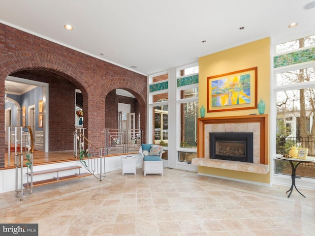 interior space featuring a tiled fireplace