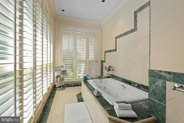 bathroom with crown molding, tile patterned floors, tile walls, and a whirlpool tub