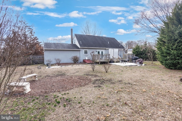 back of house with a patio area and fence