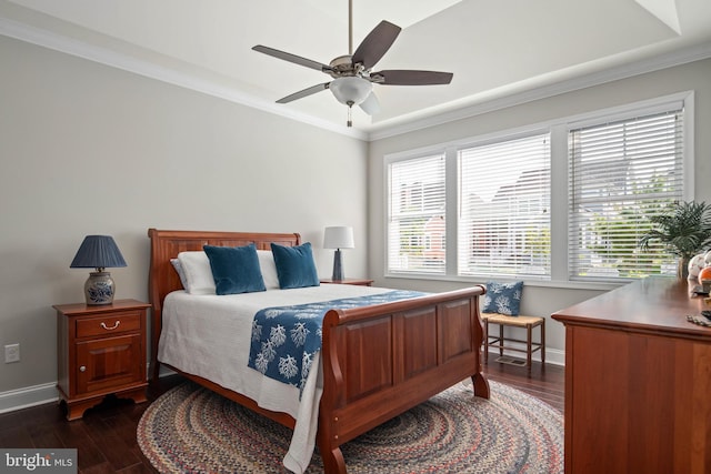 bedroom featuring baseboards, ornamental molding, and dark wood-style flooring