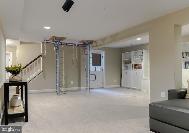 interior space featuring carpet flooring, recessed lighting, and baseboards