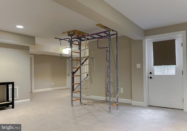 entryway with visible vents, recessed lighting, carpet, and baseboards