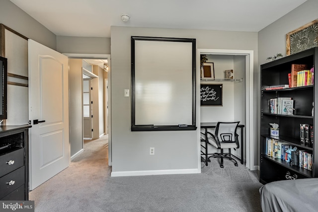 carpeted bedroom with baseboards