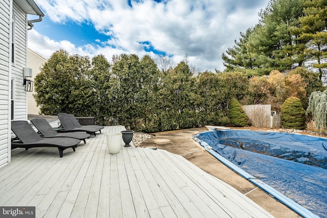 wooden deck featuring fence