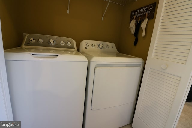 laundry area with laundry area and independent washer and dryer