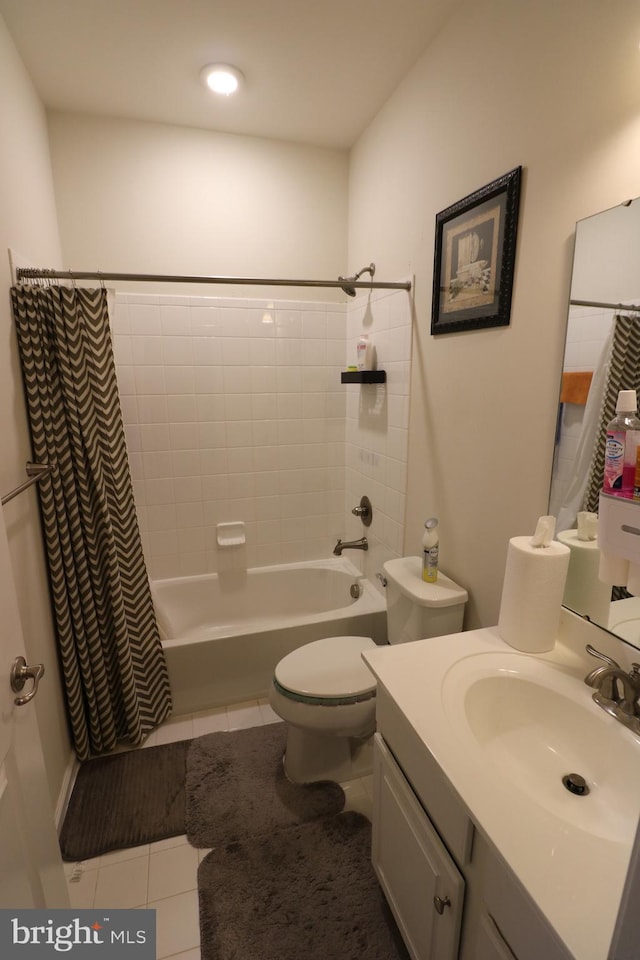 bathroom featuring tile patterned floors, toilet, vanity, and shower / bath combination with curtain