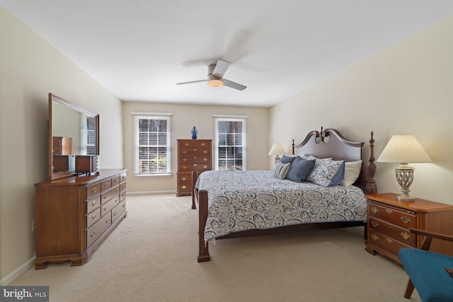 bedroom with baseboards, light carpet, and ceiling fan