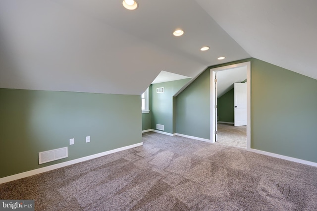 bonus room featuring recessed lighting, visible vents, and baseboards