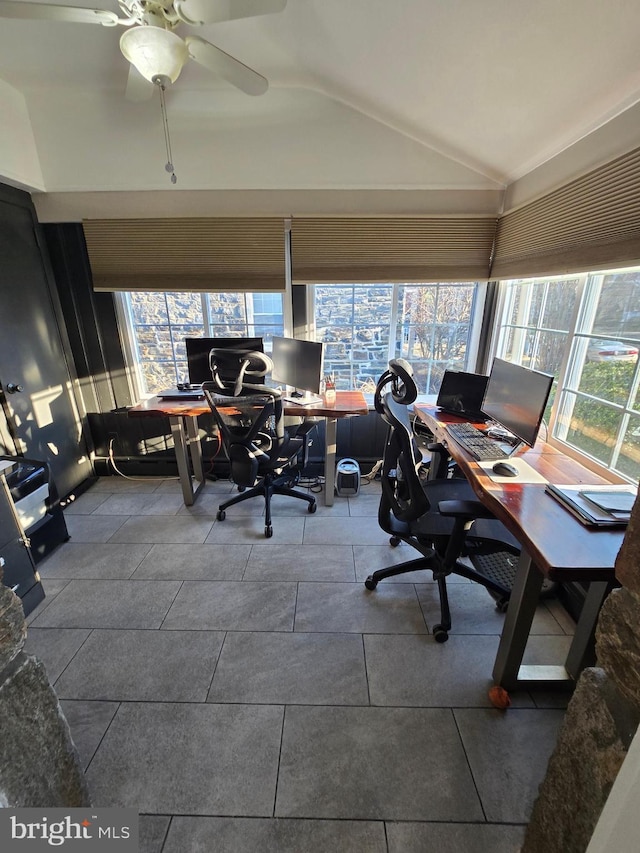 office area with ceiling fan and vaulted ceiling