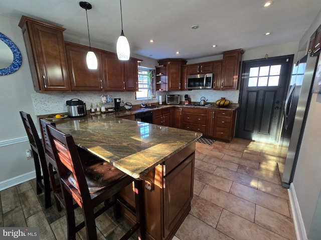 kitchen featuring open shelves, hanging light fixtures, decorative backsplash, appliances with stainless steel finishes, and a peninsula