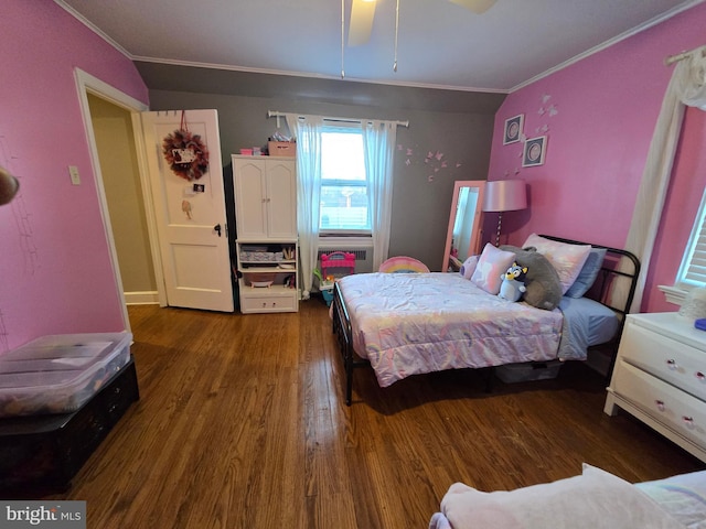 bedroom with ornamental molding, ceiling fan, and wood finished floors