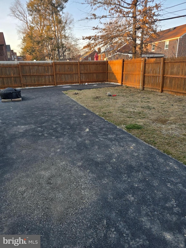 view of yard with a fenced backyard