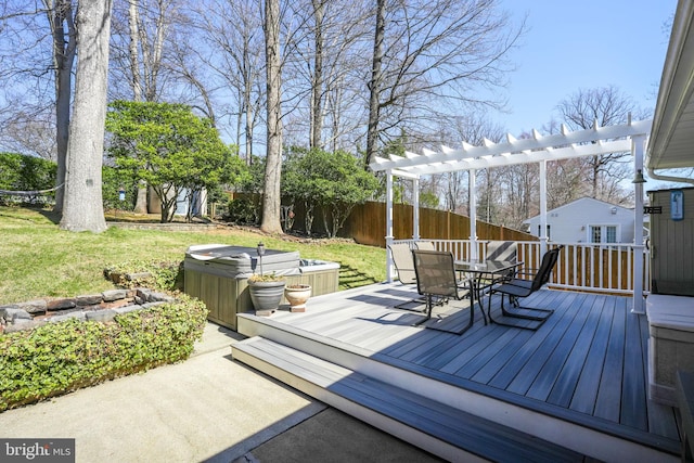 wooden deck with a yard, fence, a pergola, and a hot tub