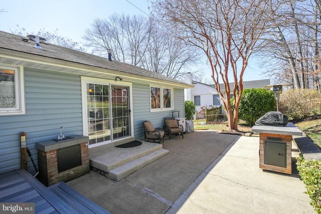 view of patio with a sink